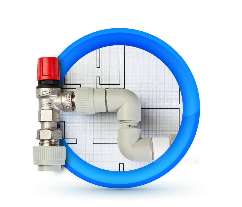 Tradesman in a hard hat fitting hot and cold water supply pipes to a wall